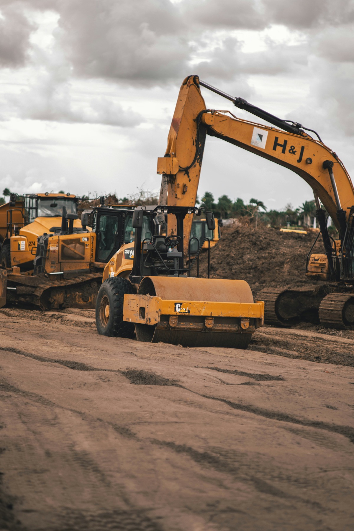 Construction machinery working on an industrial project site